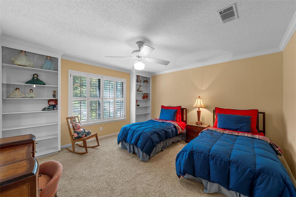 3907 Old Mill Road Waco, TX 76710 - Photo 21 of 30 a bedroom with two beds and next to a window