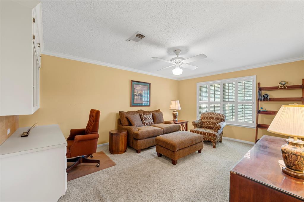 3907 Old Mill Road Waco, TX 76710 - Photo 23 of 30 a living room with furniture and a flat screen tv