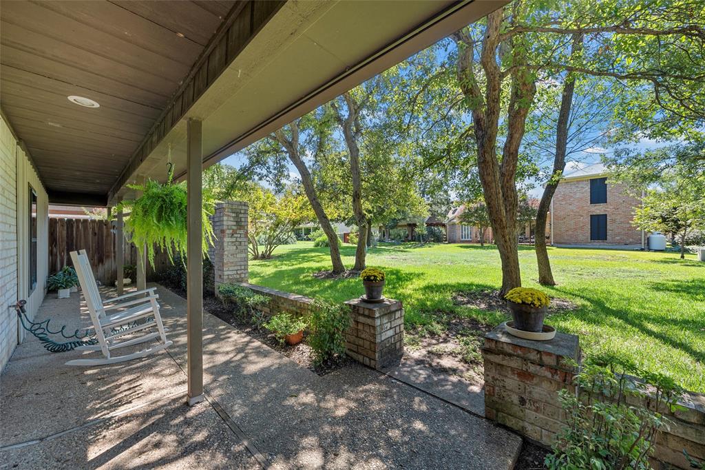 3907 Old Mill Road Waco, TX 76710 - Photo 24 of 30 a backyard of a house with lots of green space