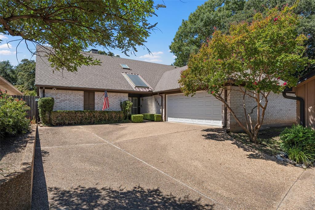 3907 Old Mill Road Waco, TX 76710 - Photo 27 of 30 a front view of a house with a yard and garage