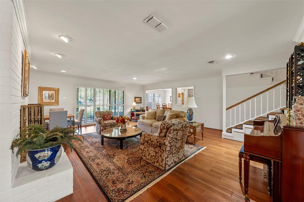 3907 Old Mill Road Waco, TX 76710 - Photo 3 of 30 a living room with fireplace furniture and a wooden floor