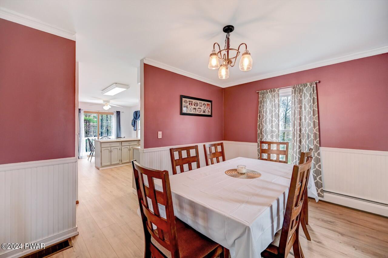 19 Ripple Lane Beach Lake, PA 18405 - Photo 12 of 52 a view of a dining room with furniture window and wooden floor