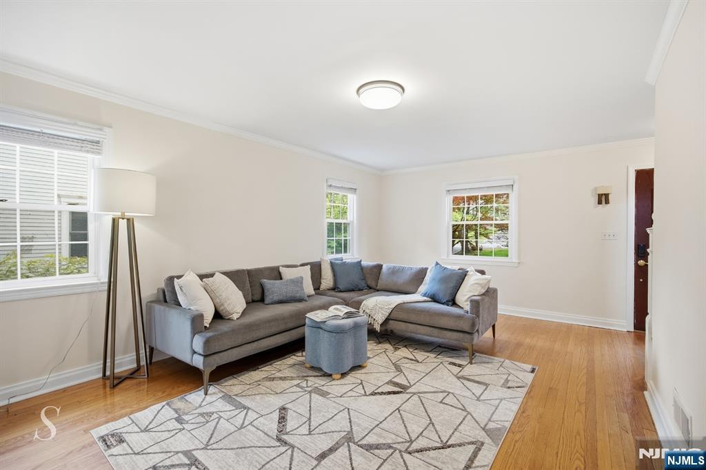 440 Kinderkamack Road River Edge, NJ 07661 - Photo 12 of 31 a living room with furniture and wooden floor