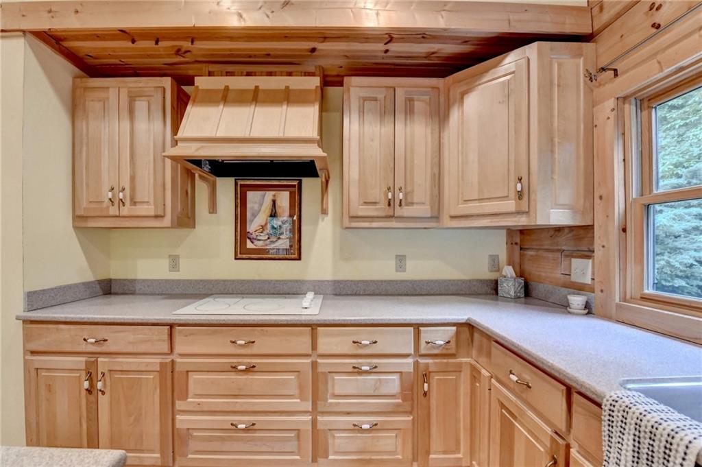 82 Walnut Grove Lane Tiger, GA 30576 - Photo 20 of 88 a kitchen with stainless steel appliances granite countertop a sink and cabinets