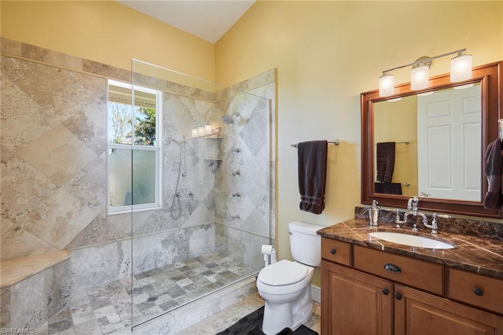 18481 Pioneer Road Fort Myers, FL 33908 - Photo 24 of 44 Bathroom #2 with tiled shower and seamless glass.