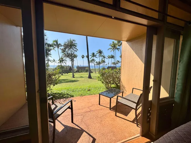 a view of swimming pool from a balcony