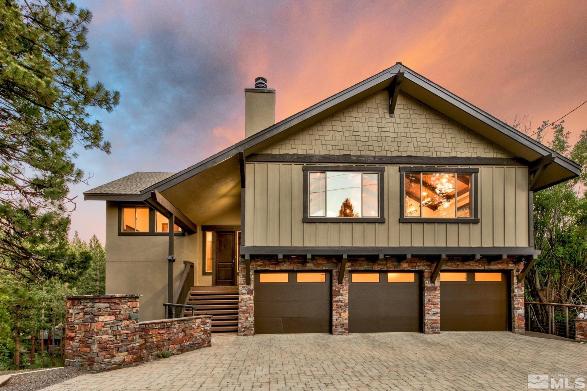 a front view of a house with yard