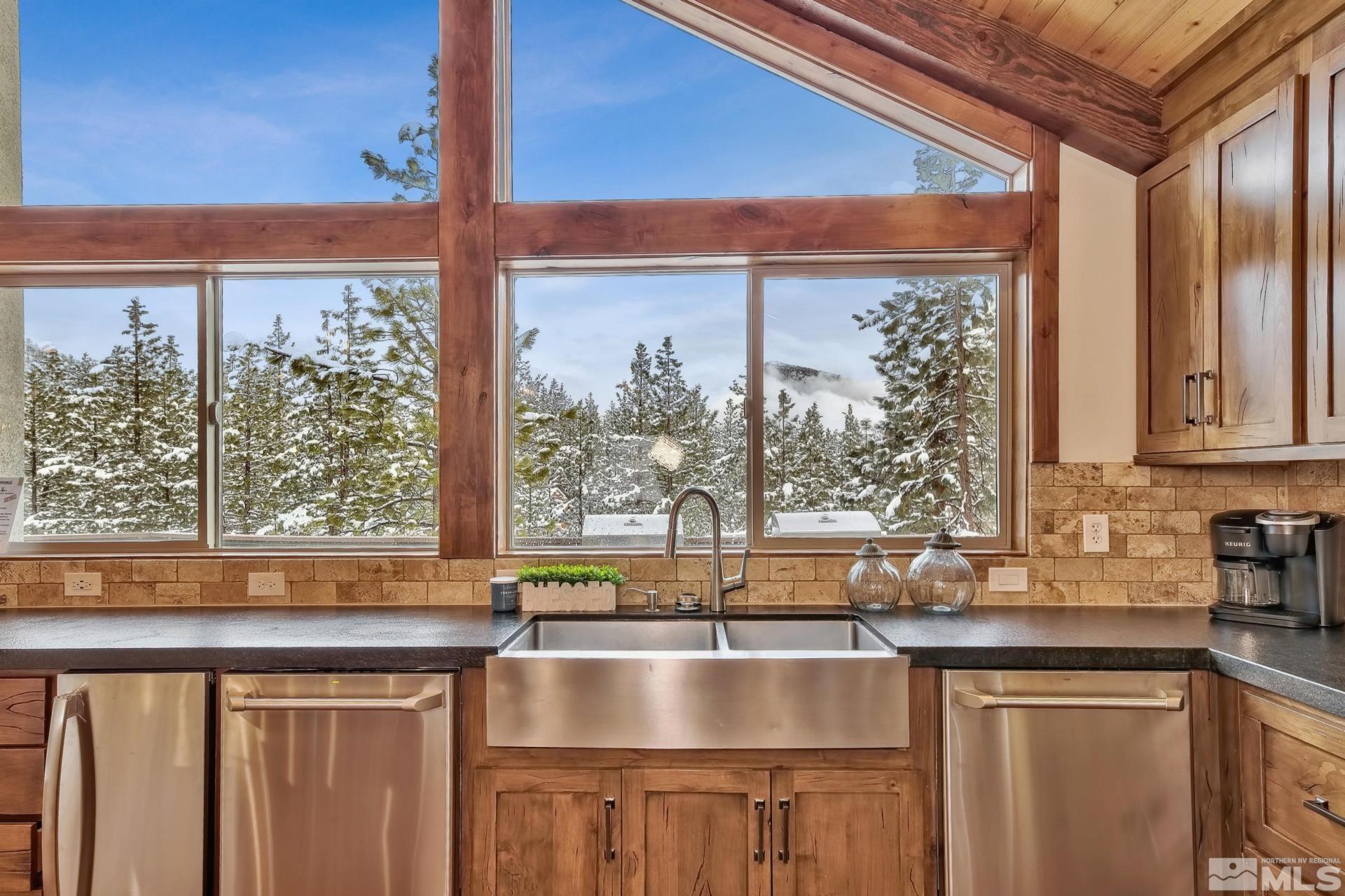 333 Ute Way Stateline, NV 89449 - Photo 12 of 40 a kitchen with a sink and a large window