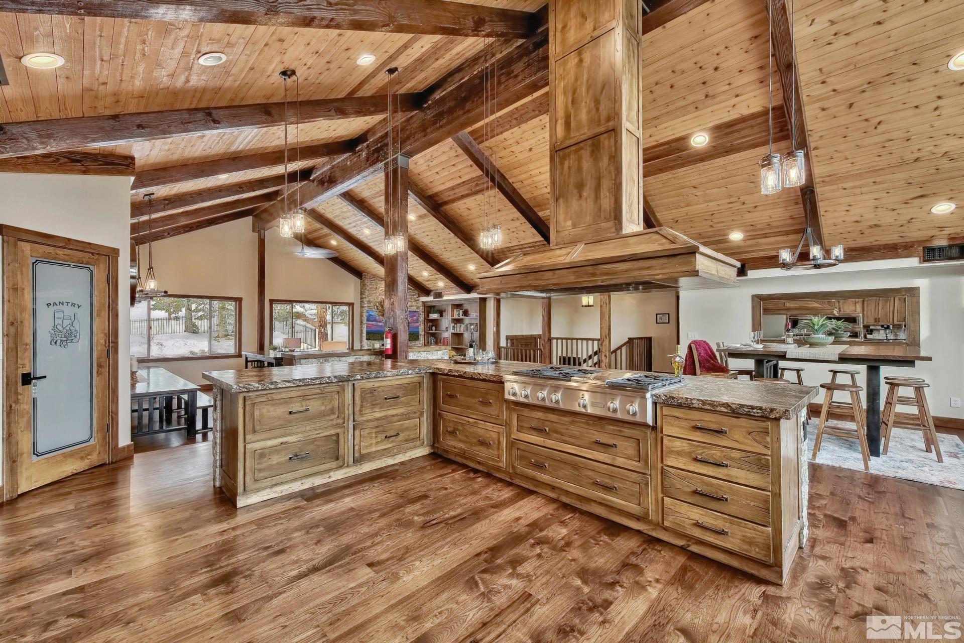 333 Ute Way Stateline, NV 89449 - Photo 13 of 40 a kitchen with stove and cabinets