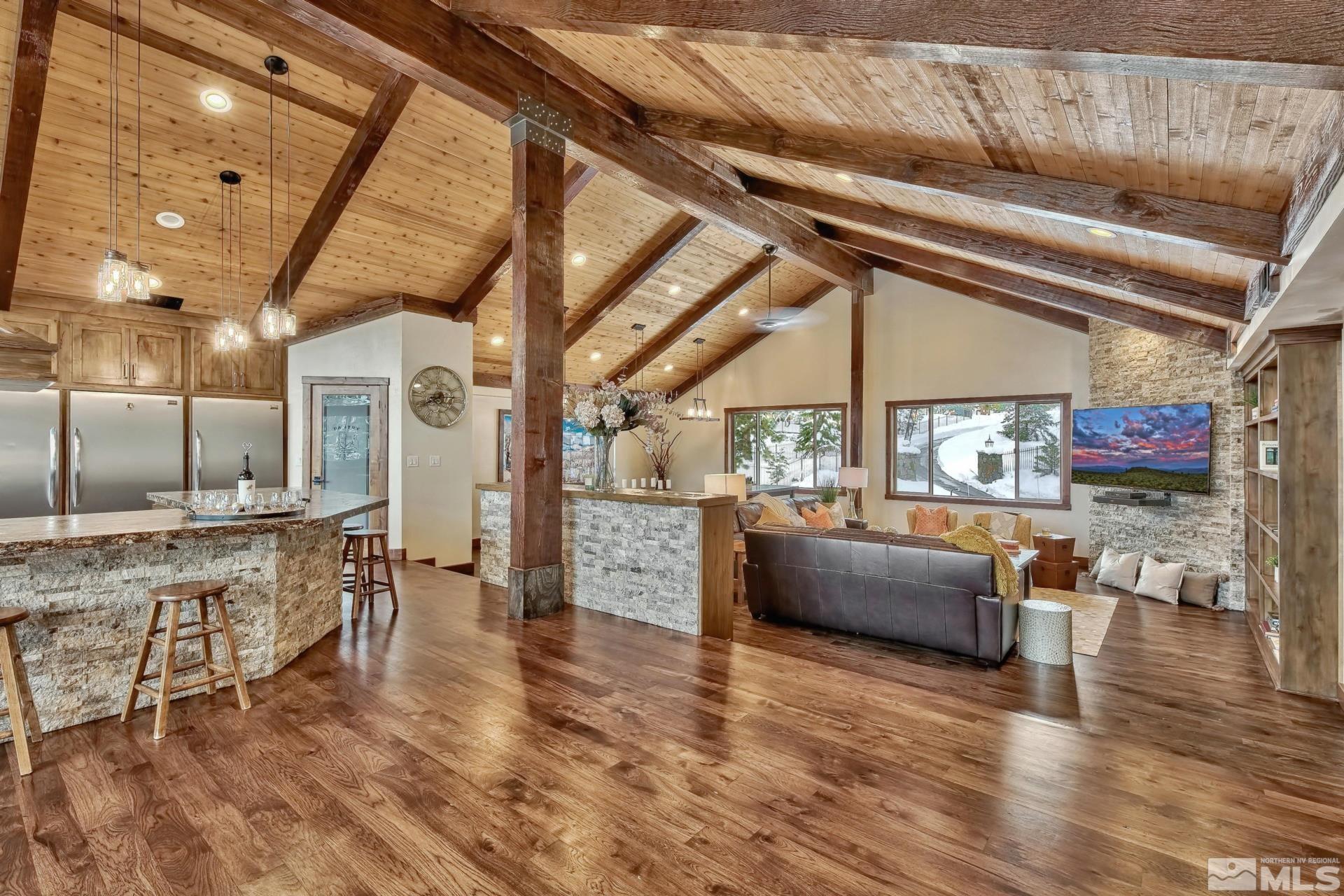 333 Ute Way Stateline, NV 89449 - Photo 14 of 40 a view of a living room and kitchen with furniture wooden floor and window