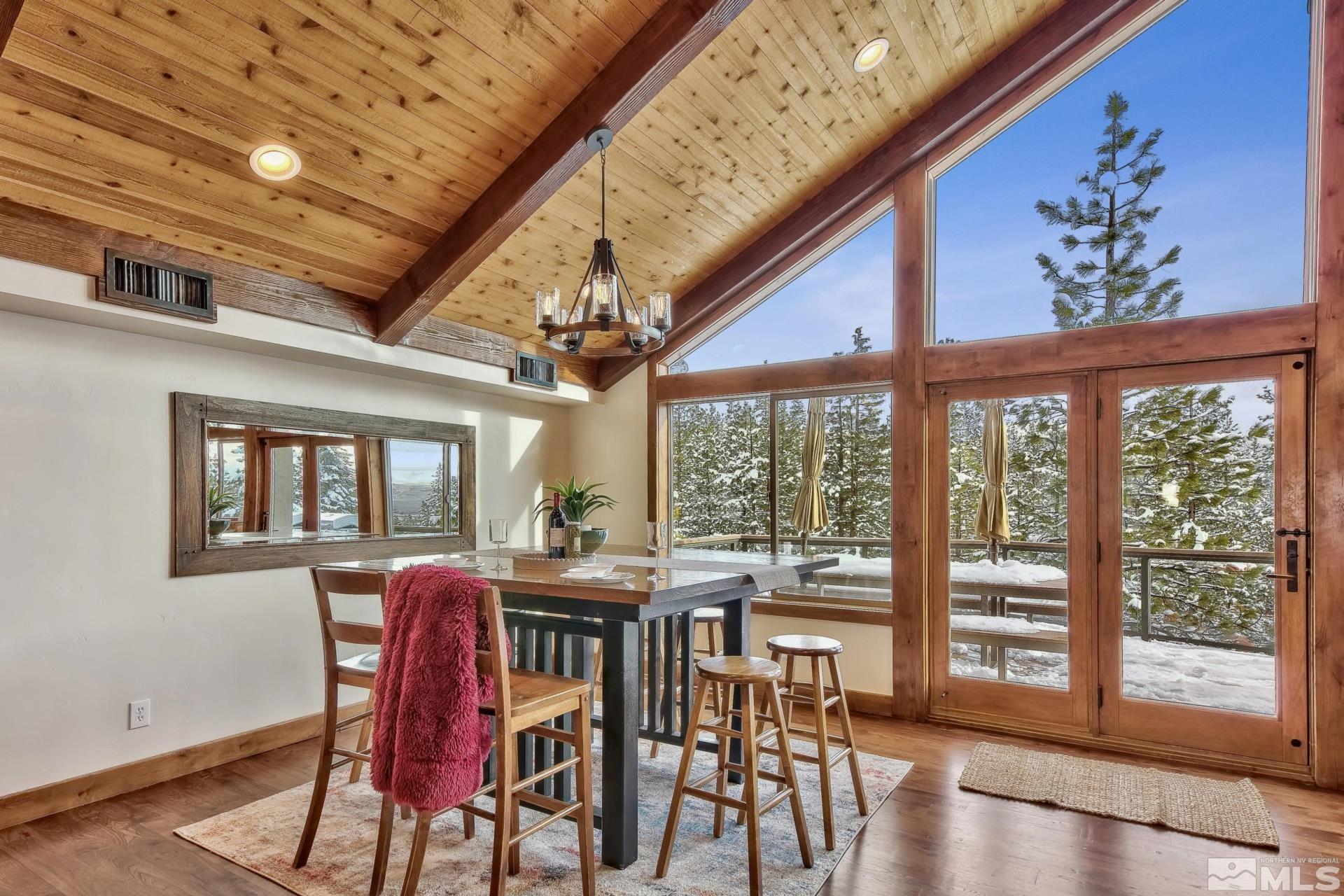 333 Ute Way Stateline, NV 89449 - Photo 15 of 40 a view of a dining room with furniture window and wooden floor