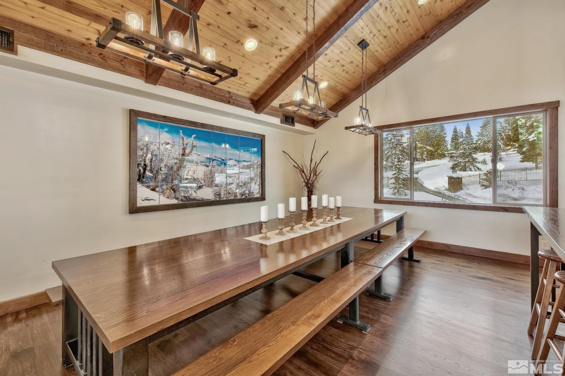 333 Ute Way Stateline, NV 89449 - Photo 17 of 40 a living room with a table chairs and wooden floor