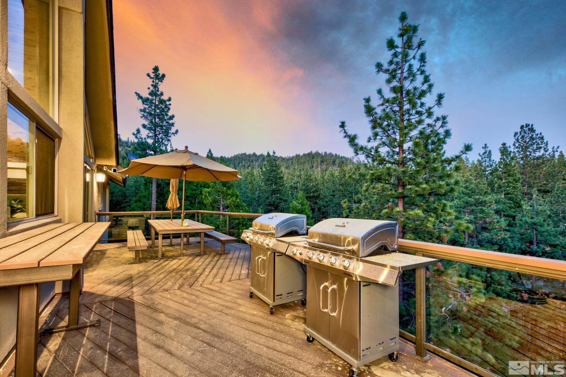 333 Ute Way Stateline, NV 89449 - Photo 19 of 40 a view of a patio with chairs under an umbrella