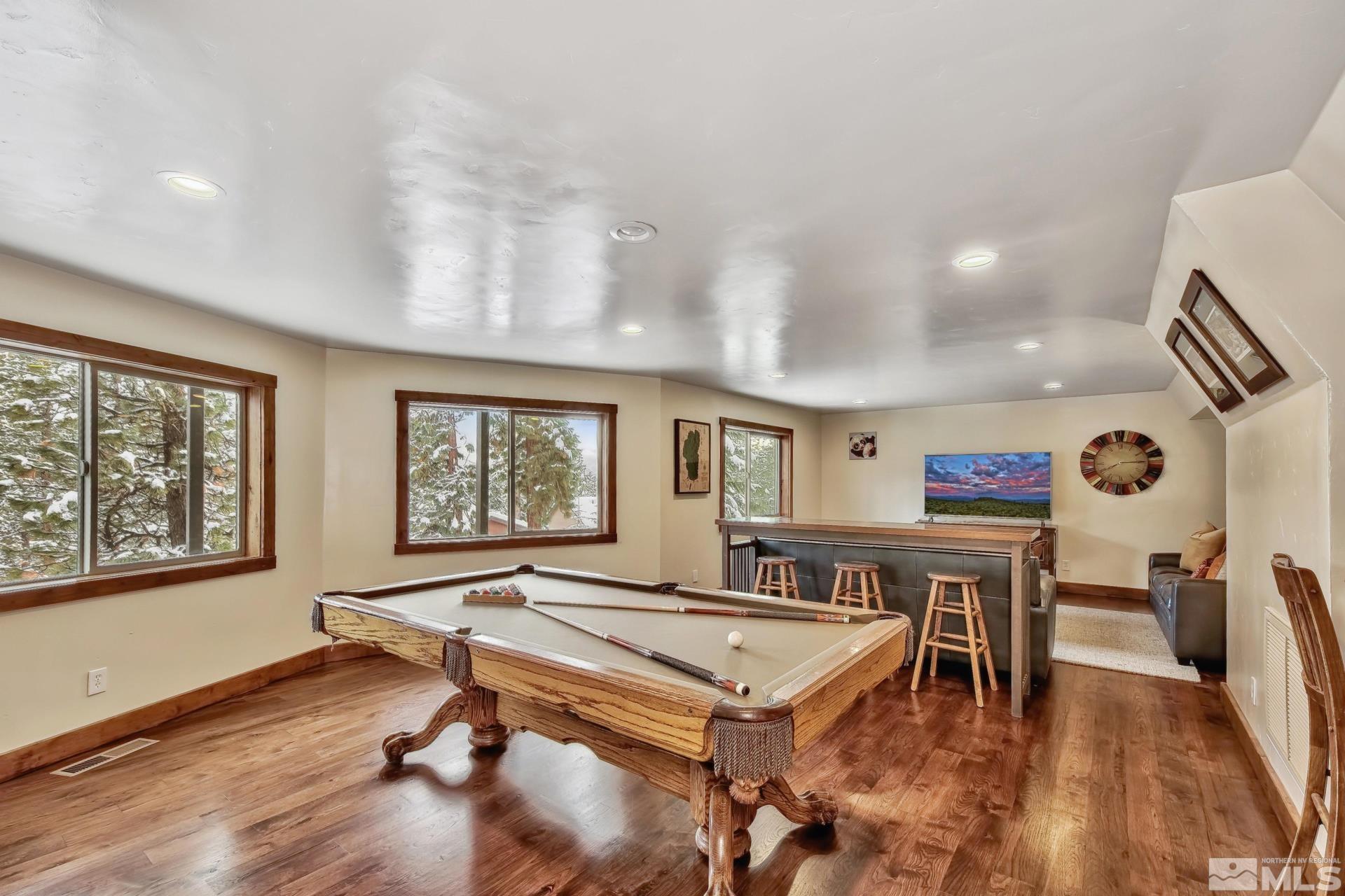 333 Ute Way Stateline, NV 89449 - Photo 30 of 40 a living room with furniture a rug and a large window