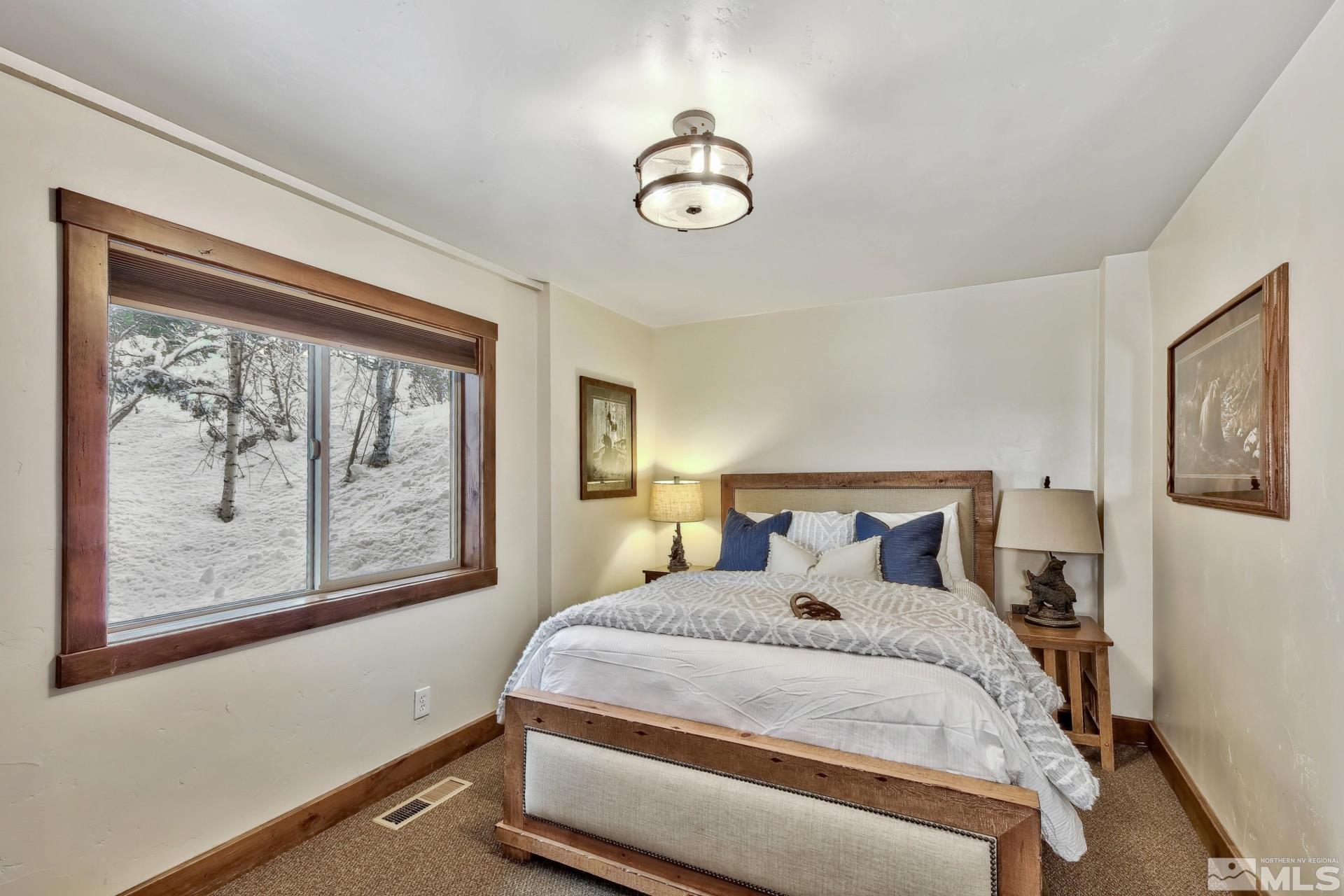 333 Ute Way Stateline, NV 89449 - Photo 40 of 40 a bedroom with a bed and a window