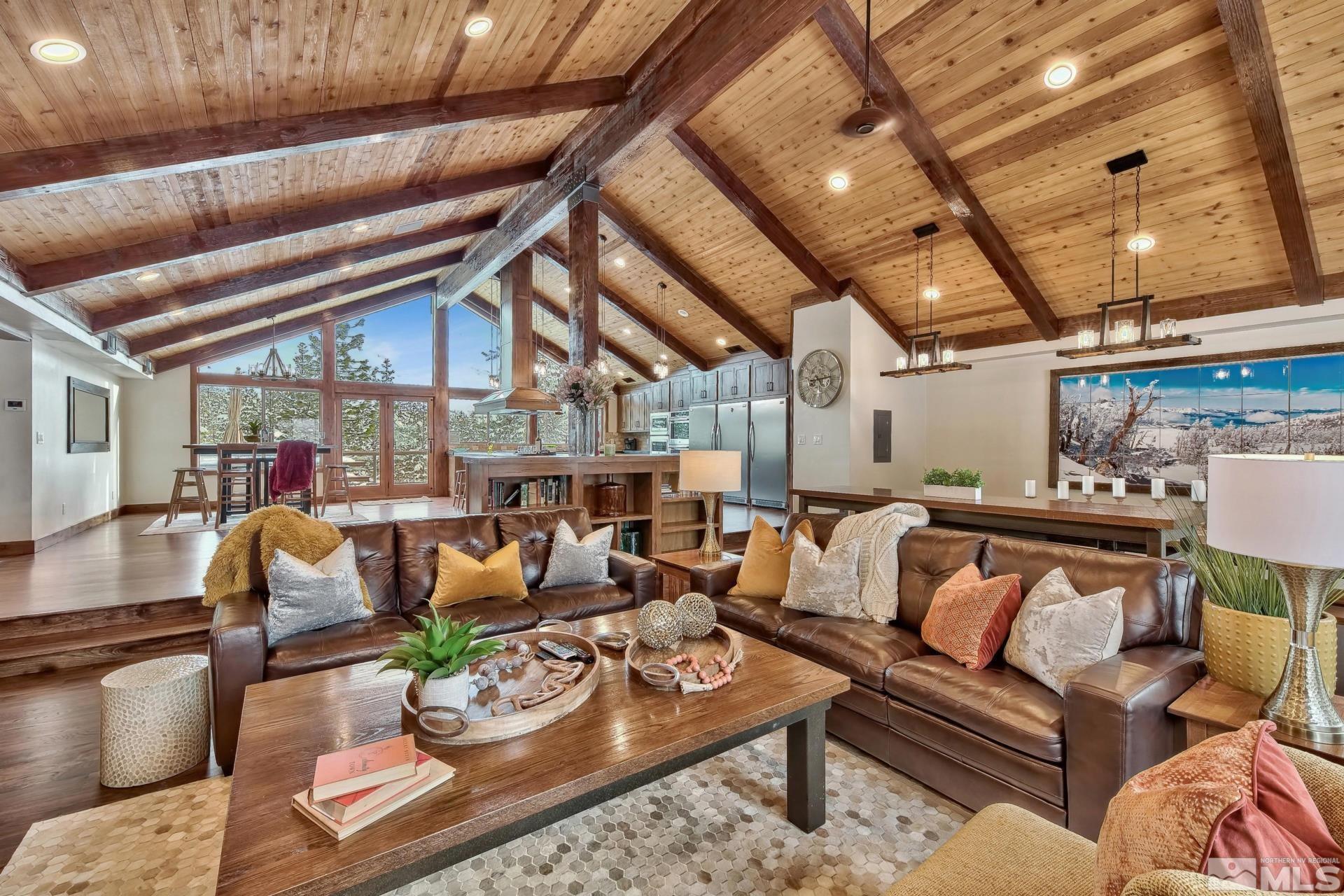 333 Ute Way Stateline, NV 89449 - Photo 8 of 40 a living room with furniture and a chandelier