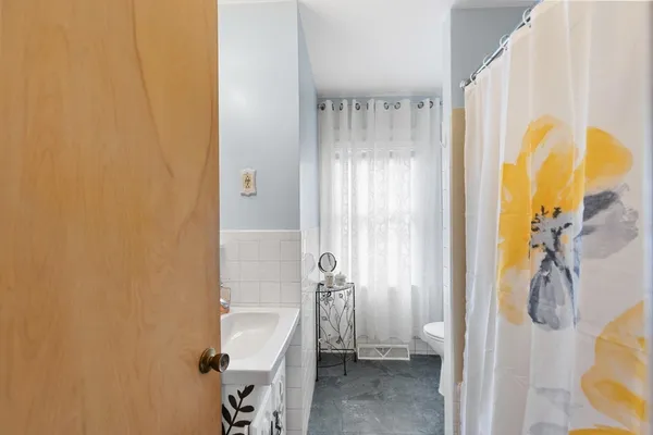 a bathroom with a sink and a shower