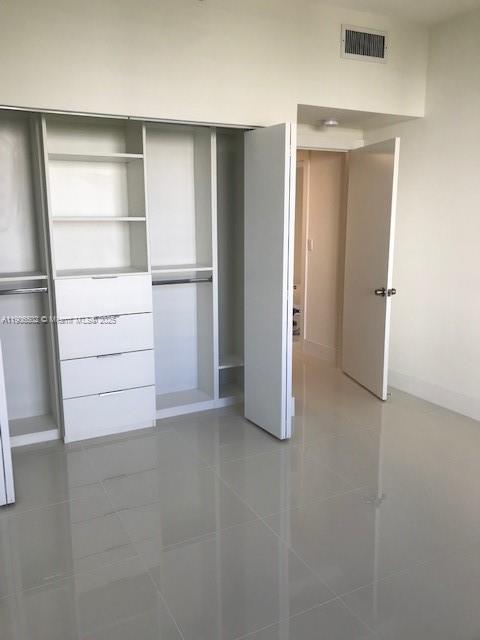 251 Crandon Boulevard, Unit 535 Key Biscayne, FL 33149 - Photo 11 of 14 a view of an empty walk in closet