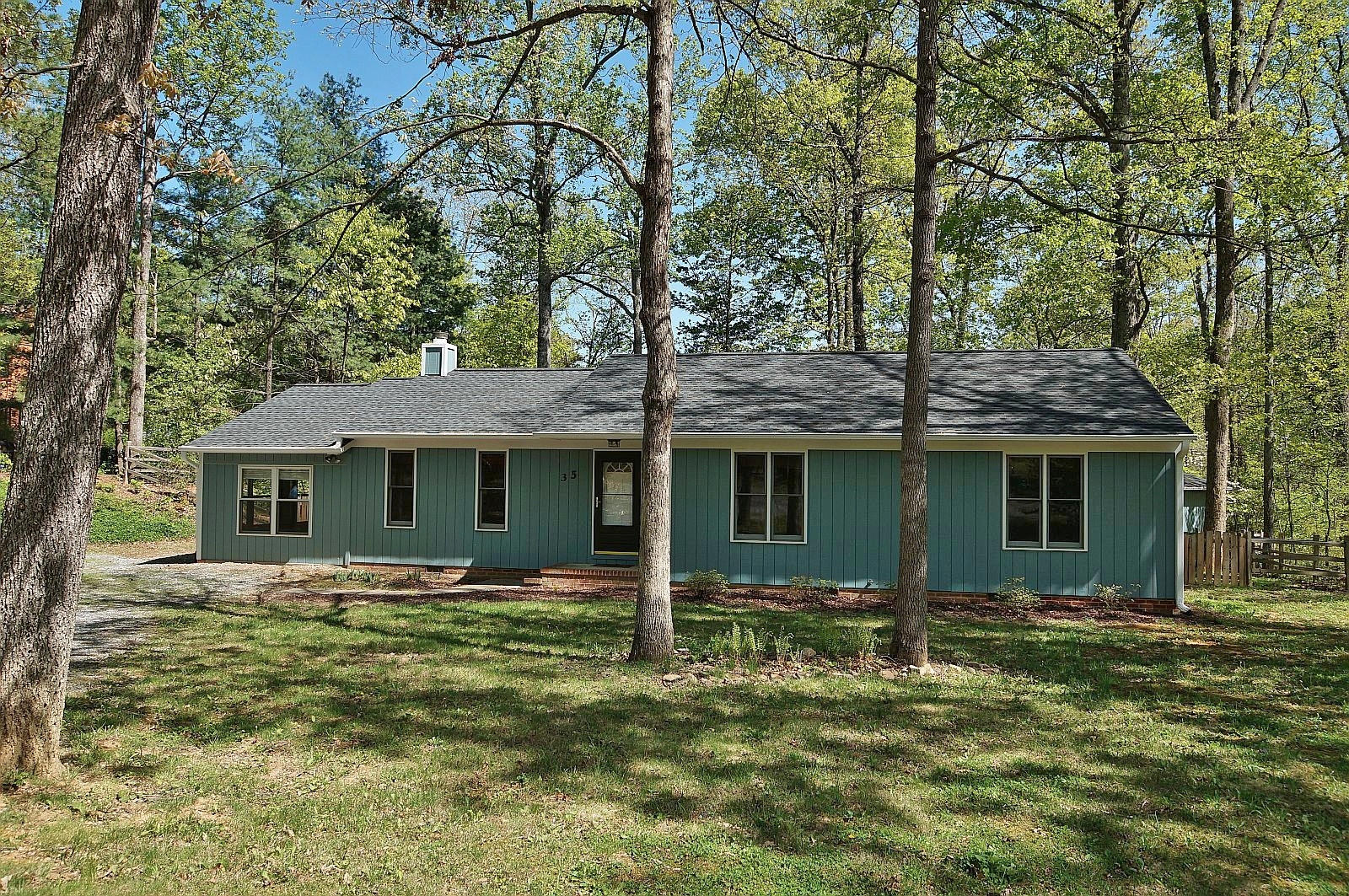 35 Oak Leaf Drive Blue Ridge, VA 24064 - Photo 1 of 36 front view of a house with a yard