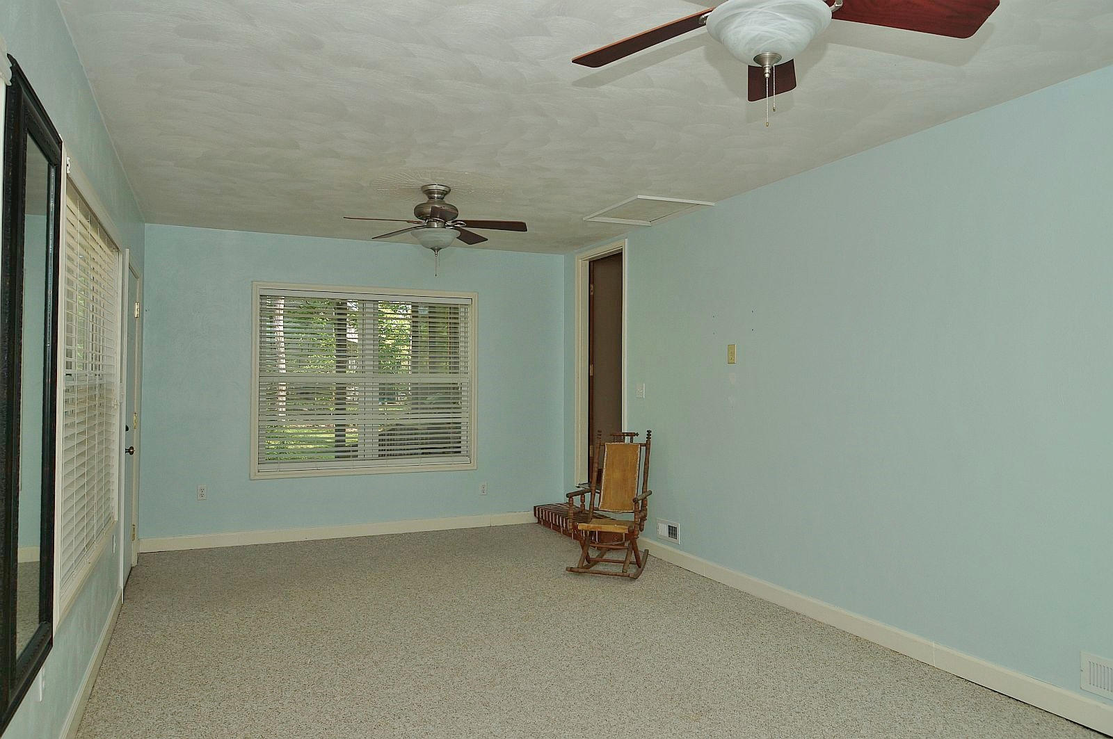 35 Oak Leaf Drive Blue Ridge, VA 24064 - Photo 10 of 36 an empty room with windows