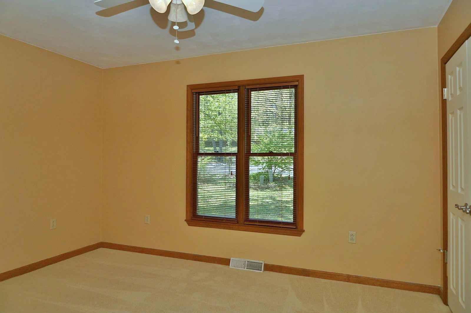 35 Oak Leaf Drive Blue Ridge, VA 24064 - Photo 19 of 36 a view of a room with a window and a ceiling fan