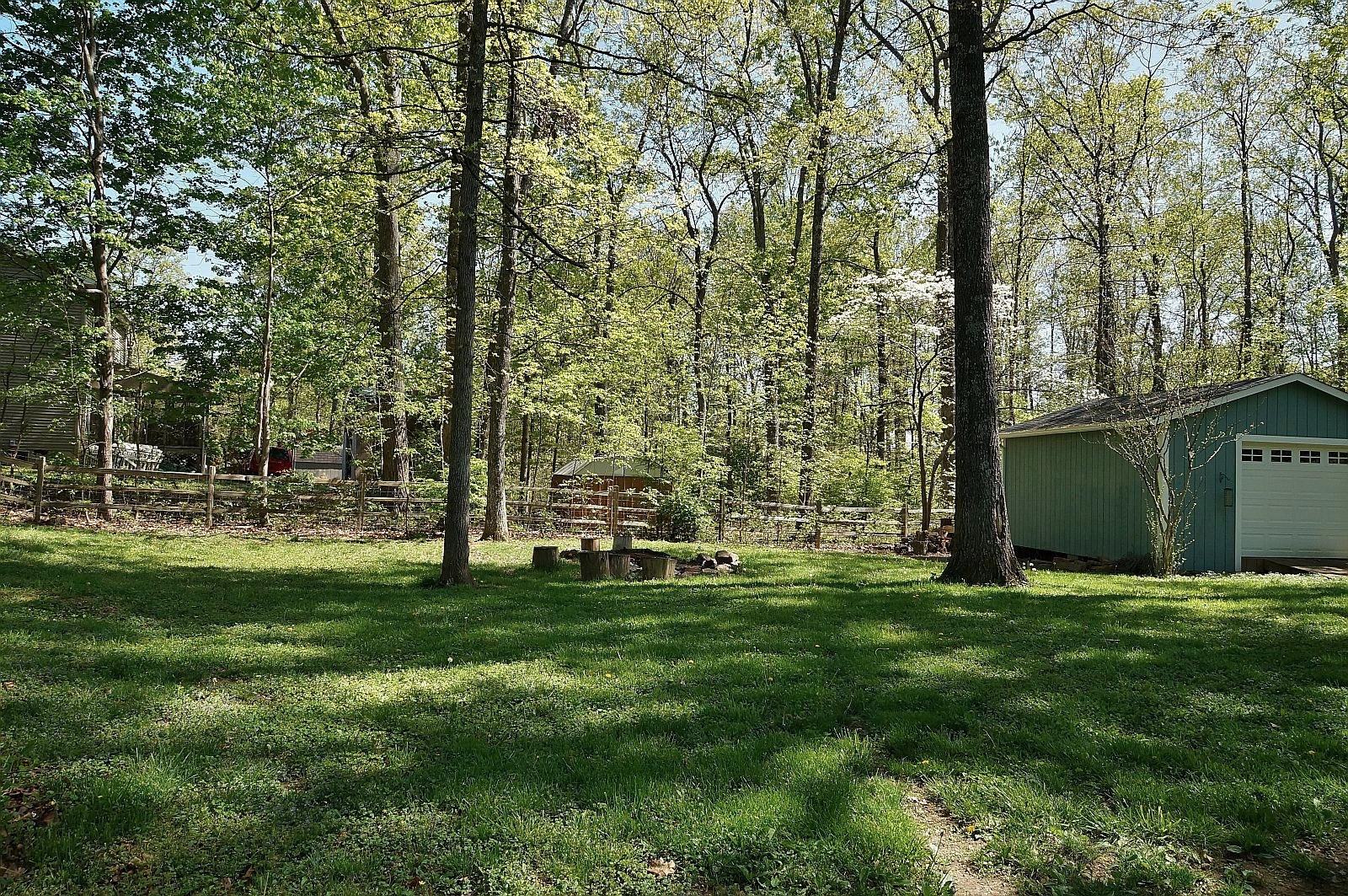 35 Oak Leaf Drive Blue Ridge, VA 24064 - Photo 31 of 36 a view of a backyard with large trees