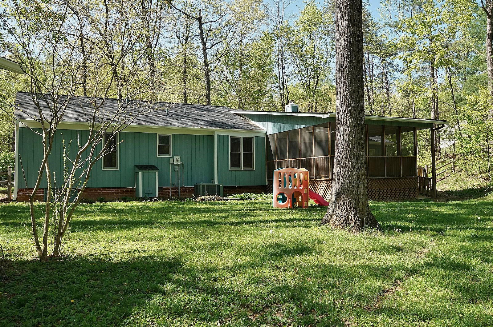 35 Oak Leaf Drive Blue Ridge, VA 24064 - Photo 32 of 36 a view of a house with a backyard