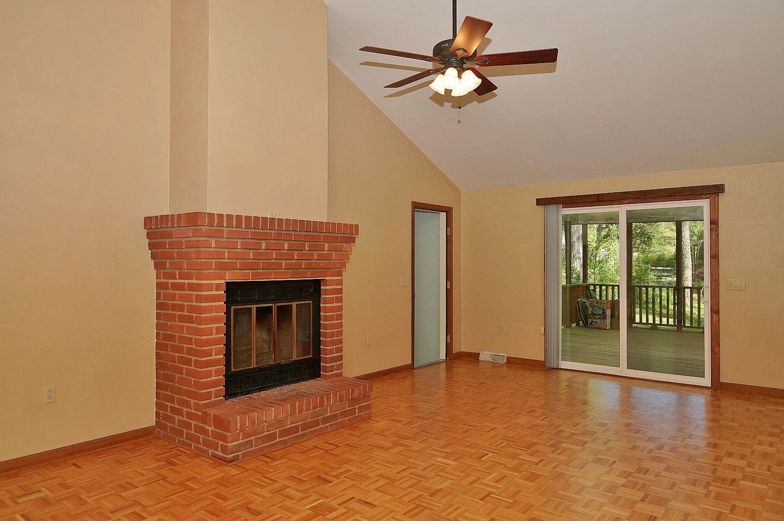 35 Oak Leaf Drive Blue Ridge, VA 24064 - Photo 5 of 36 a view of an empty room with window and chandelier fan