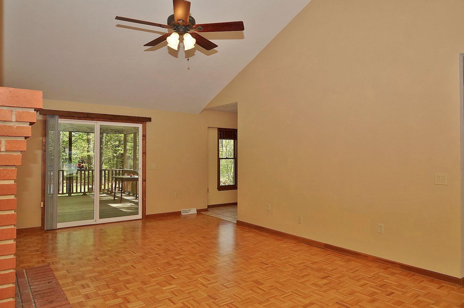 35 Oak Leaf Drive Blue Ridge, VA 24064 - Photo 6 of 36 an empty room with chandelier fan and windows