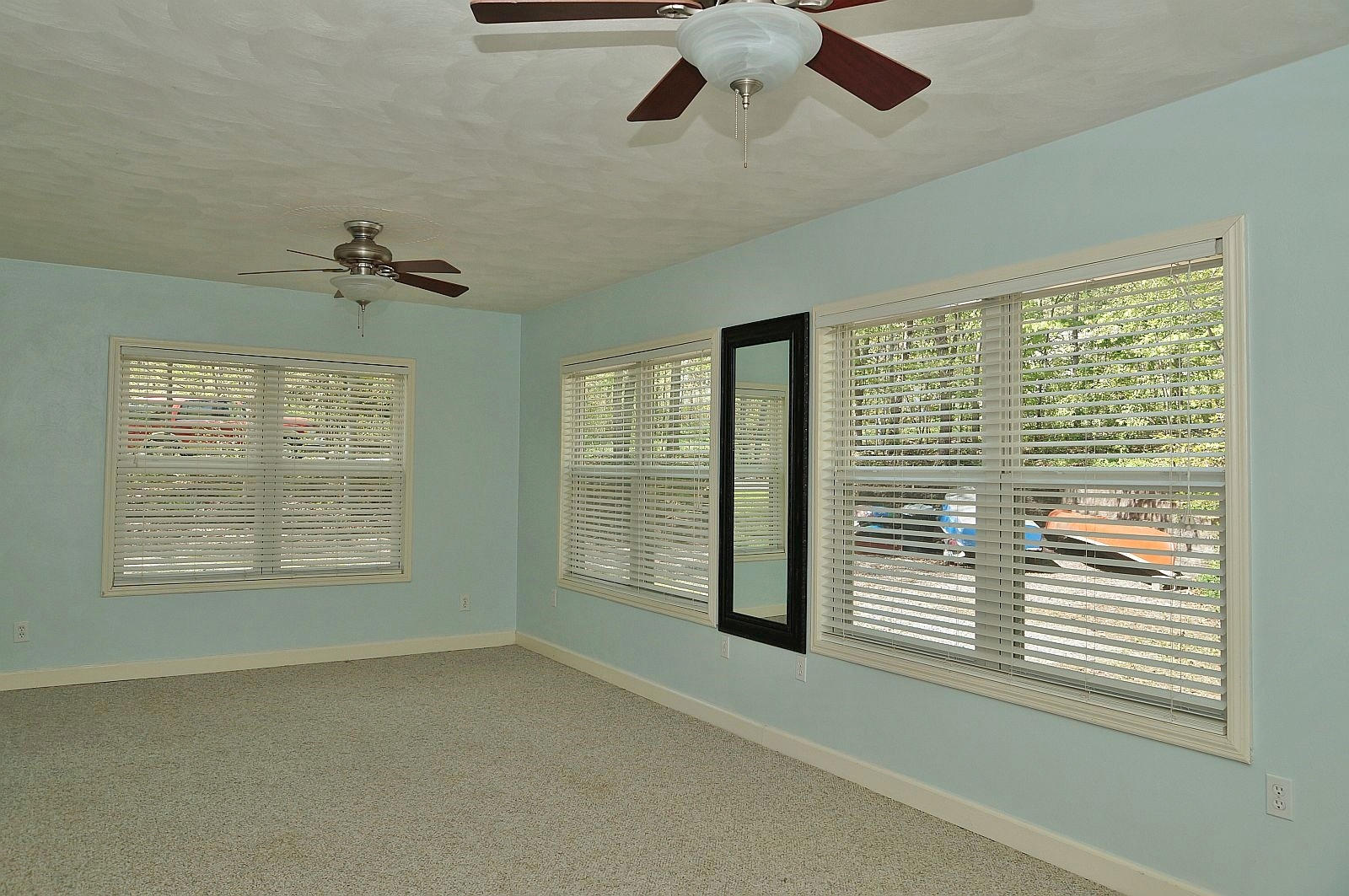 35 Oak Leaf Drive Blue Ridge, VA 24064 - Photo 8 of 36 a view of an empty room with a window