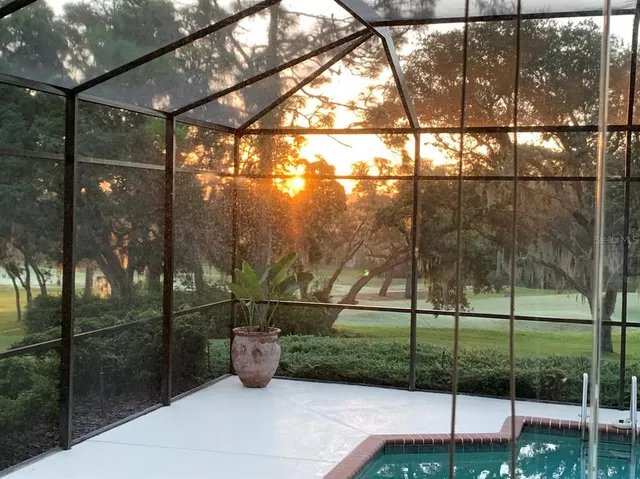 a sign that is sitting on a brick wall