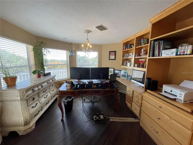 a bathroom with a granite countertop sink mirror and double