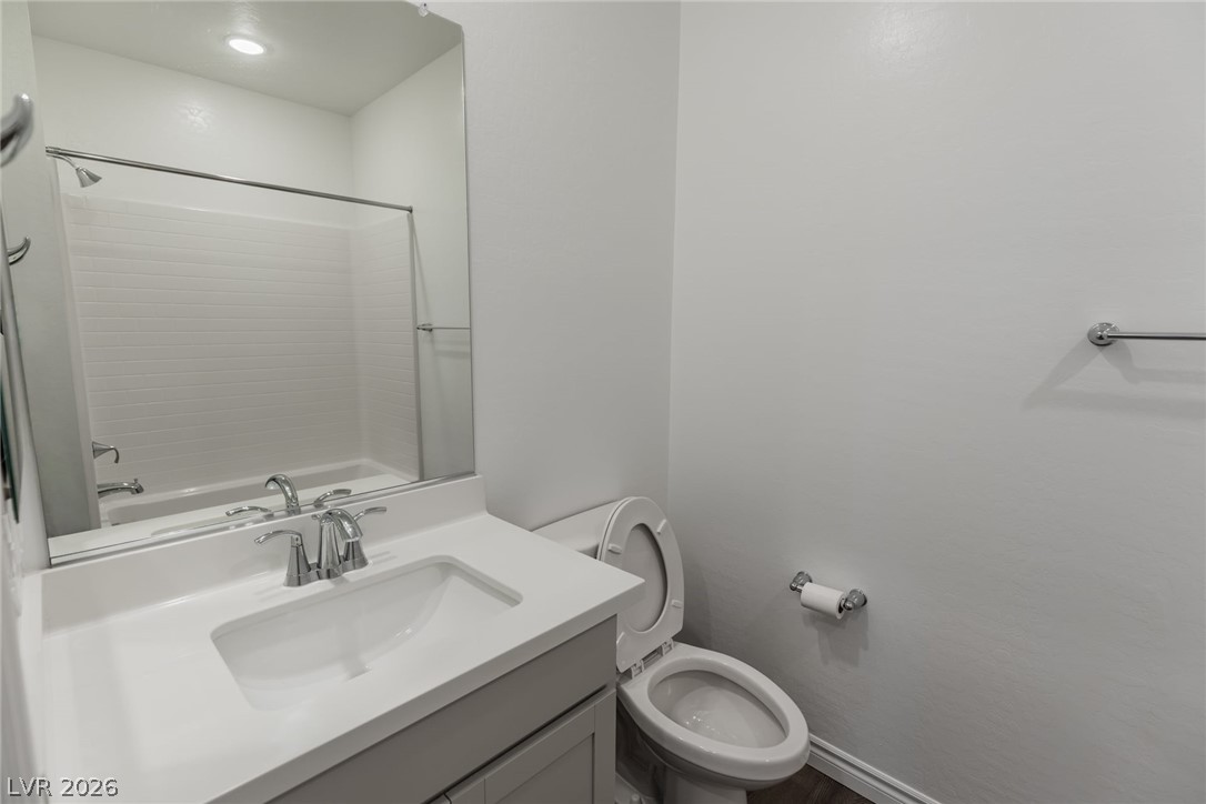 2555 Hampton Road, Unit 8206 Henderson, NV 89052 - Photo 21 of 35 This bathroom offers a contemporary vanity, sleek fixtures, and a bright, inviting ambiance.