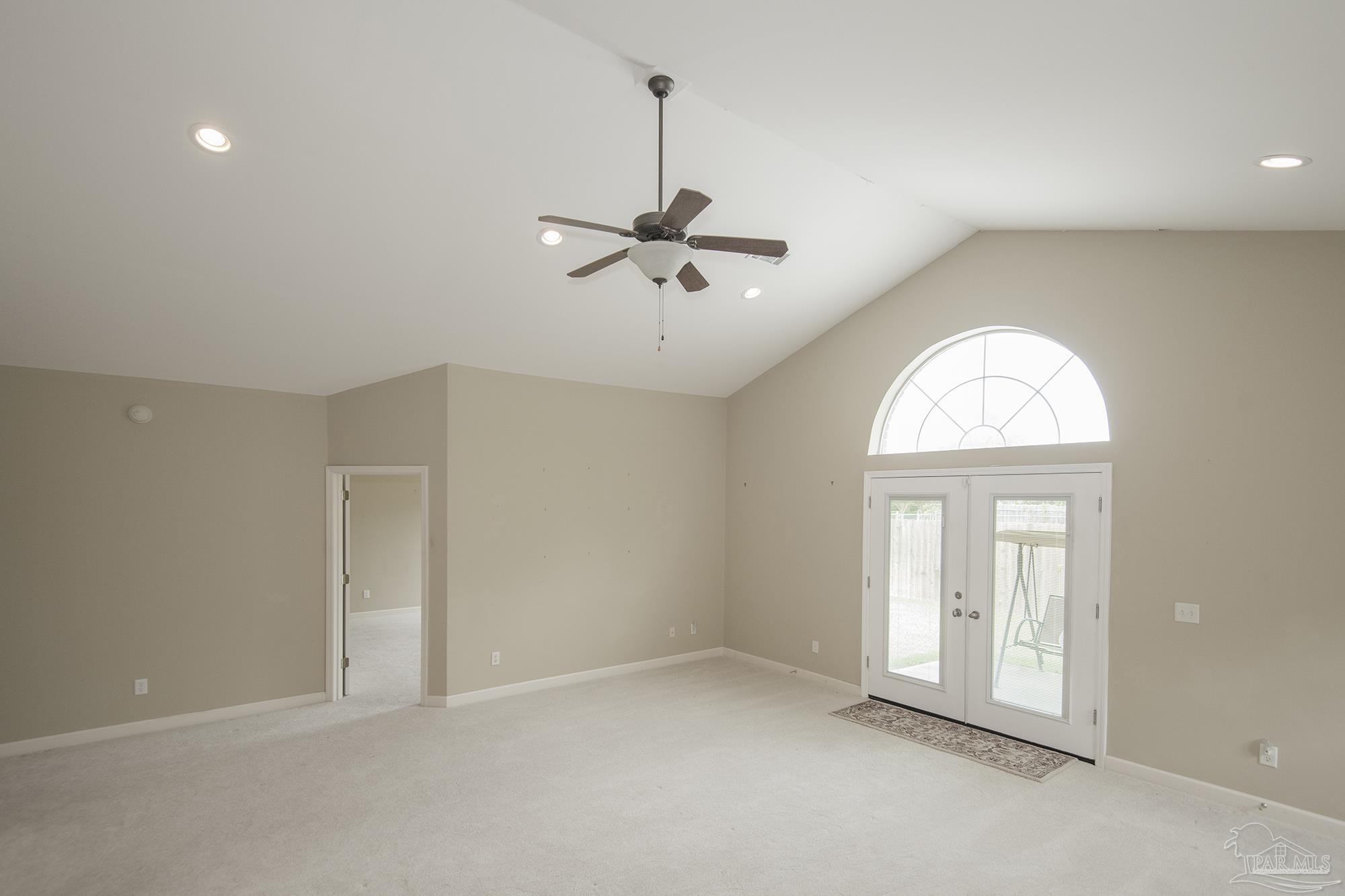 3200 Silverleaf Drive Pensacola, FL 32504 - Photo 12 of 38 an empty room with fan and windows