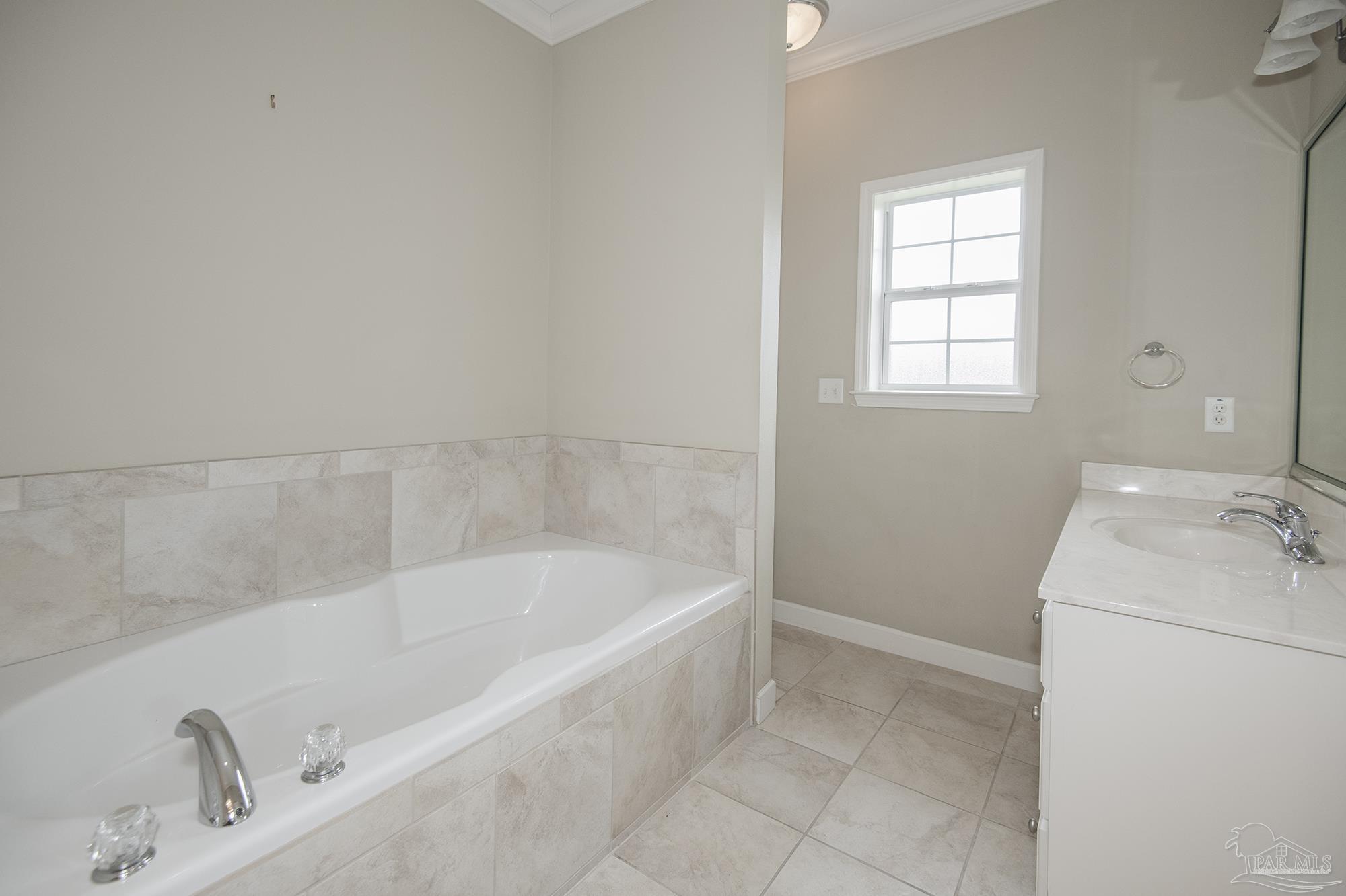 3200 Silverleaf Drive Pensacola, FL 32504 - Photo 18 of 38 a bath tub sitting next to a white sink
