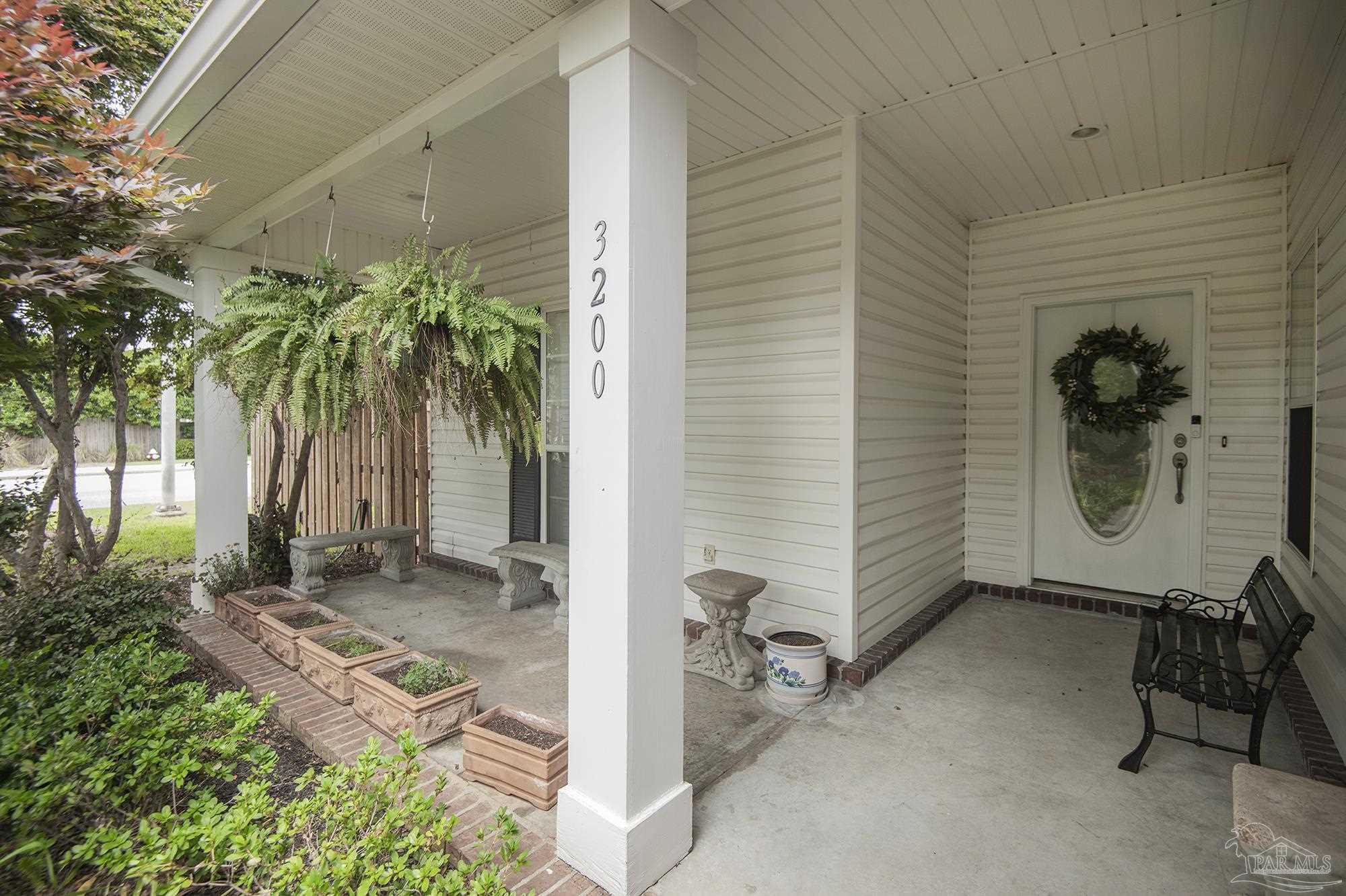 3200 Silverleaf Drive Pensacola, FL 32504 - Photo 2 of 38 a view of a backyard with a patio