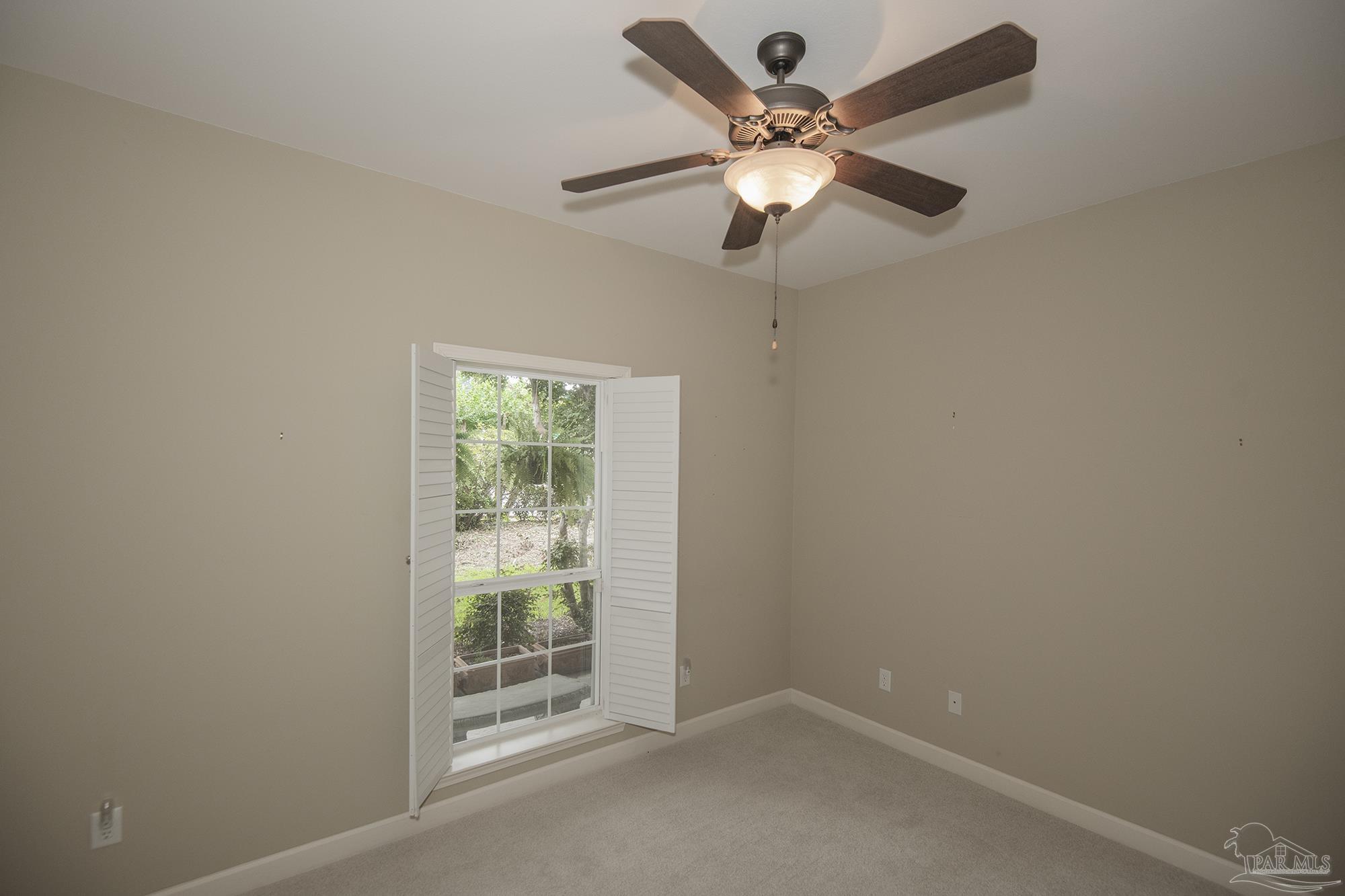 3200 Silverleaf Drive Pensacola, FL 32504 - Photo 24 of 38 an empty room with a window