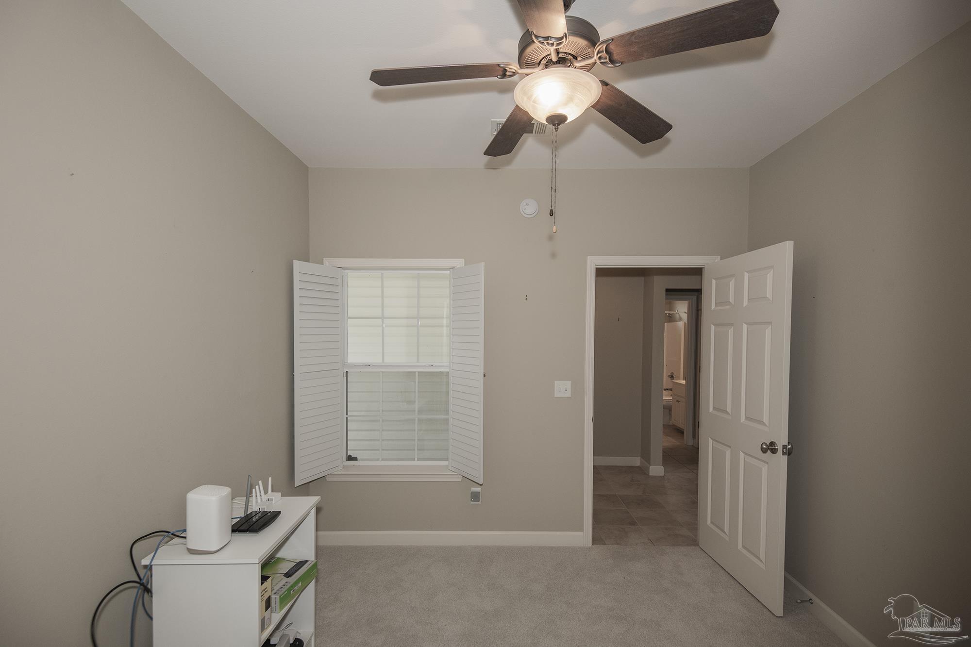3200 Silverleaf Drive Pensacola, FL 32504 - Photo 27 of 38 wooden floor in a room with a window