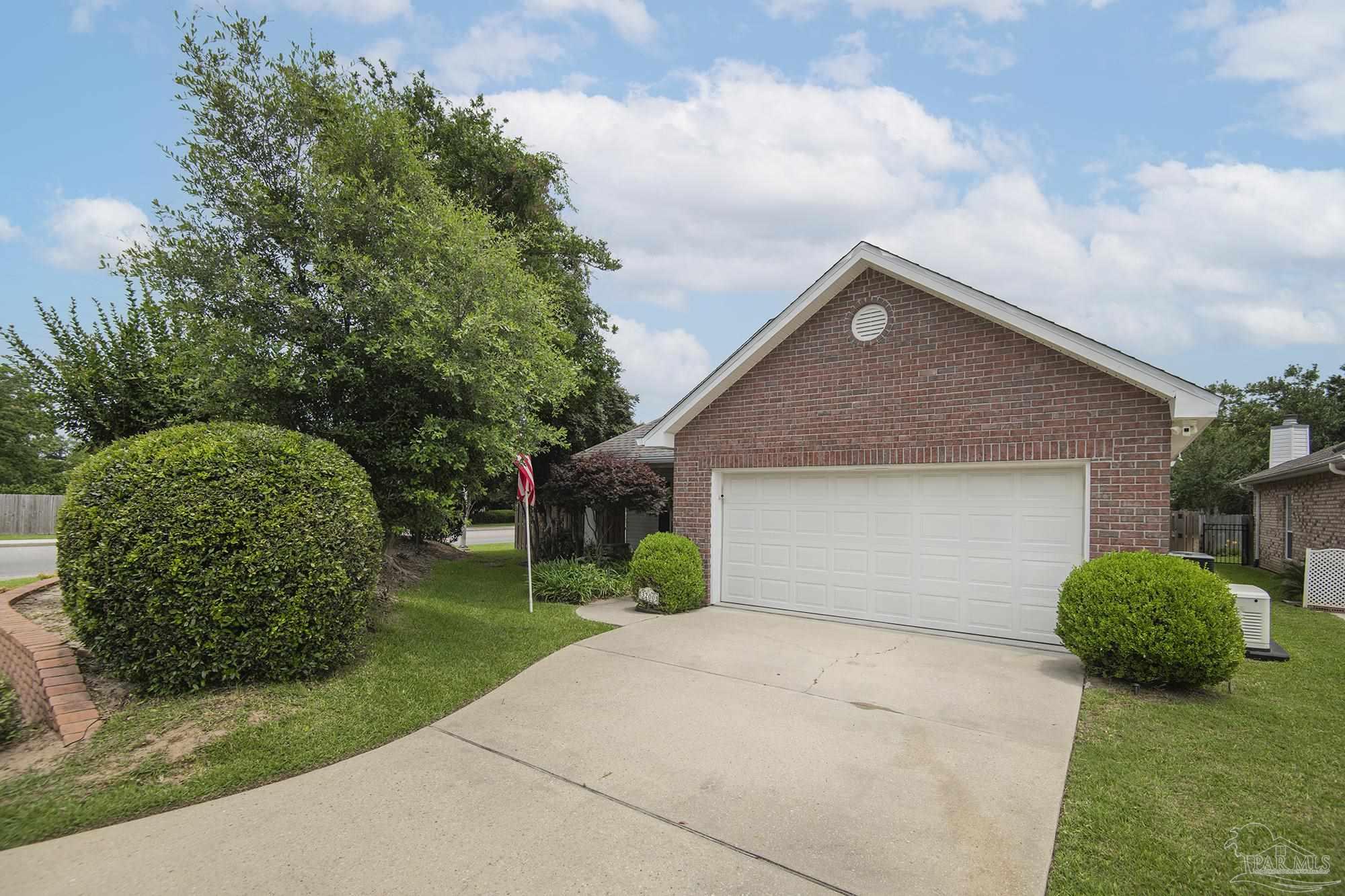 3200 Silverleaf Drive Pensacola, FL 32504 - Photo 38 of 38 a front view of a house with garden