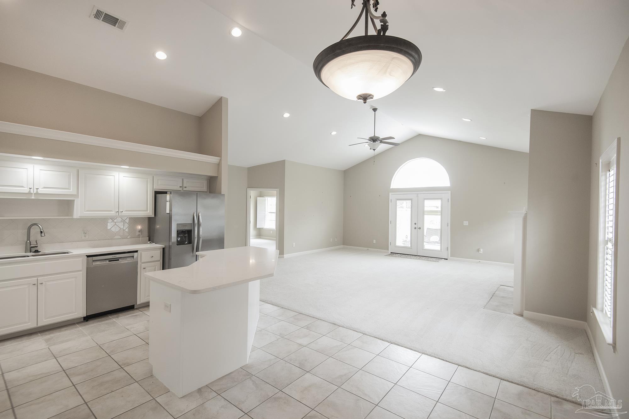 3200 Silverleaf Drive Pensacola, FL 32504 - Photo 9 of 38 a view of a kitchen with a sink and a large window