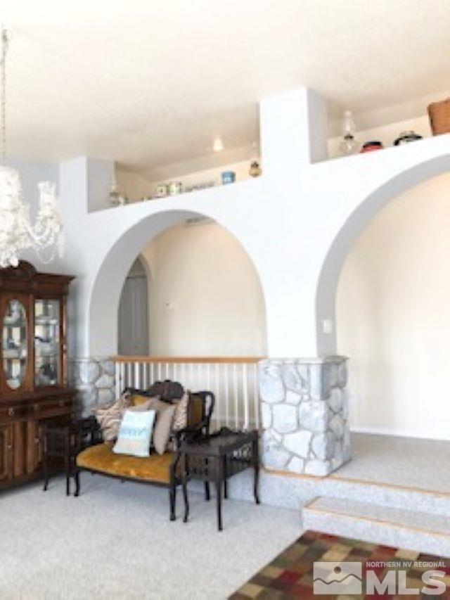 2640 Castle Peak Road Reno, NV 89521 - Photo 10 of 25 a living room with furniture and a large window