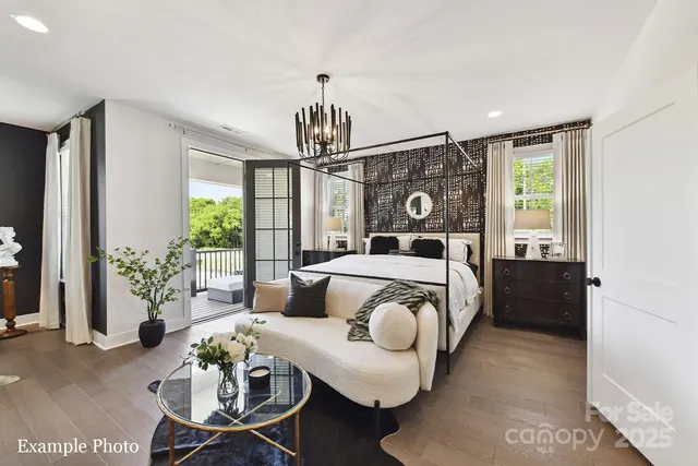 a bedroom with furniture and a window