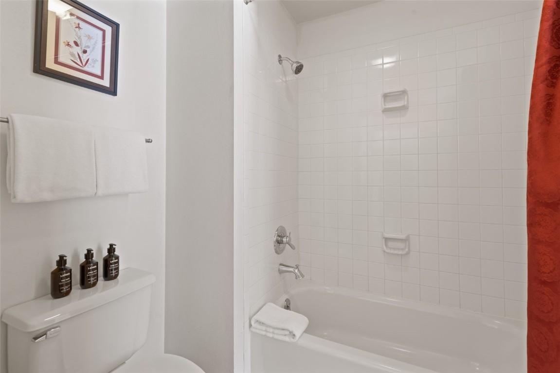 22174 Highway 6, Unit 1531 Keystone, CO 80435 - Photo 14 of 27 a bathroom with a bathtub and shower