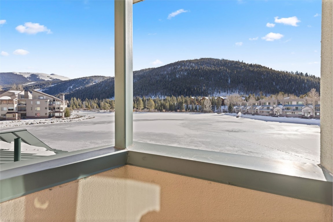 22174 Highway 6, Unit 1531 Keystone, CO 80435 - Photo 19 of 27 a view of a house with a mountain