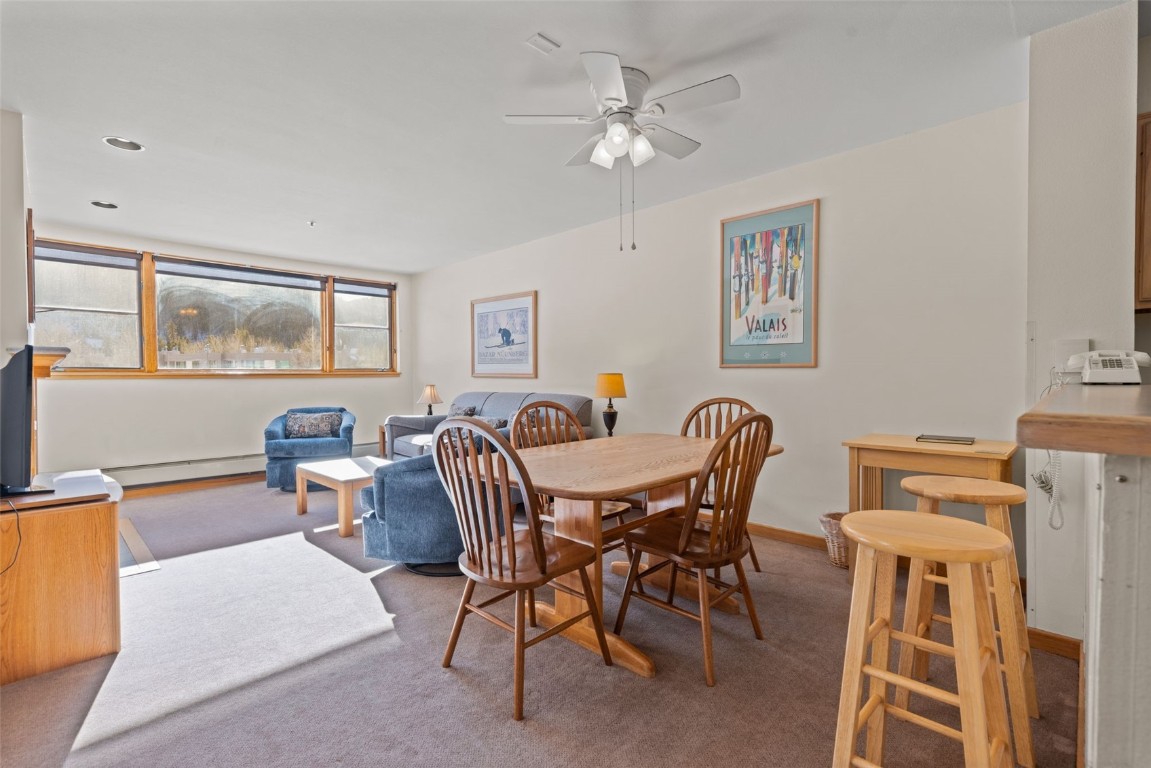 22174 Highway 6, Unit 1531 Keystone, CO 80435 - Photo 8 of 27 a view of a dining room with furniture