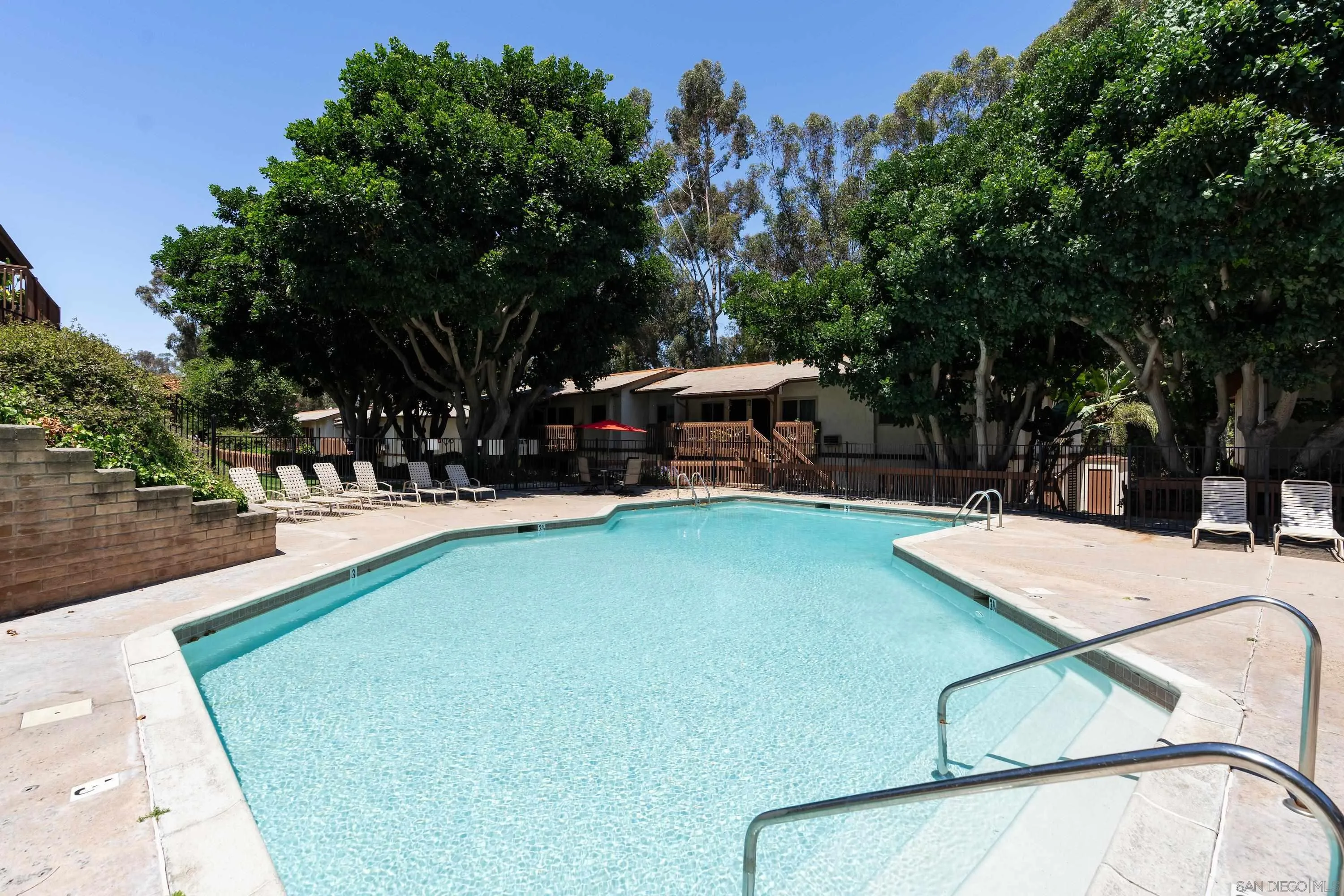 6376 Rancho Mission Road, Unit 402 San Diego, CA 92108 - Photo 22 of 27 a view of a house with swimming pool