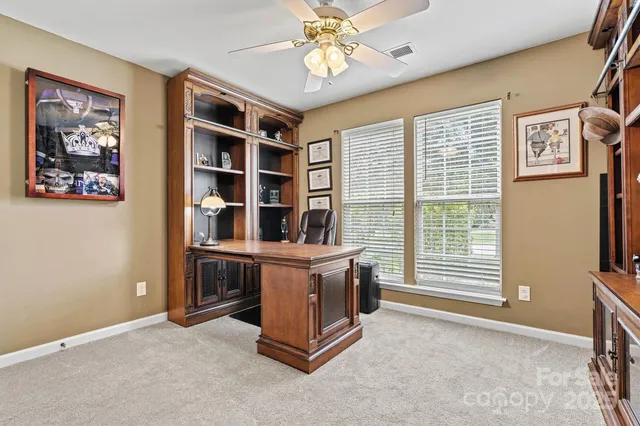 a front view of house with yard slide and outdoor seating