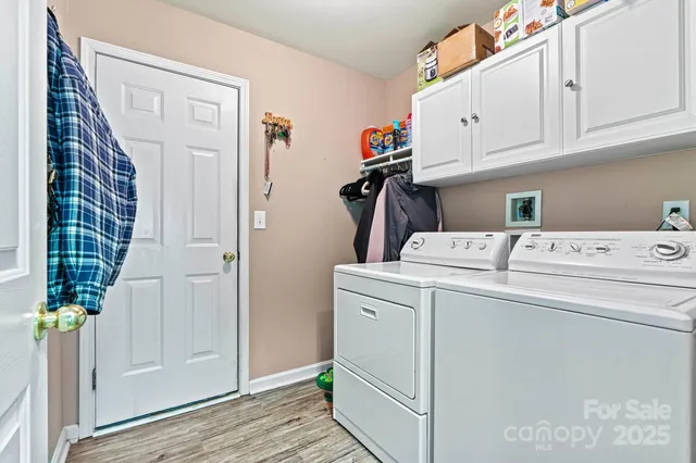 a view of a wrought iron stairs from a balcony