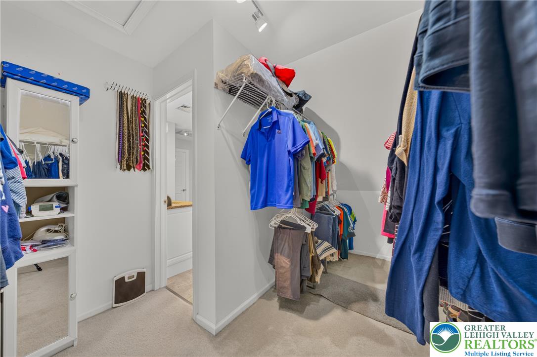 1702 Red Bud Road Quakertown, PA 18951 - Photo 42 of 68 Ample hanging space and shelving organize a complete wardrobe in this adaptable closet.