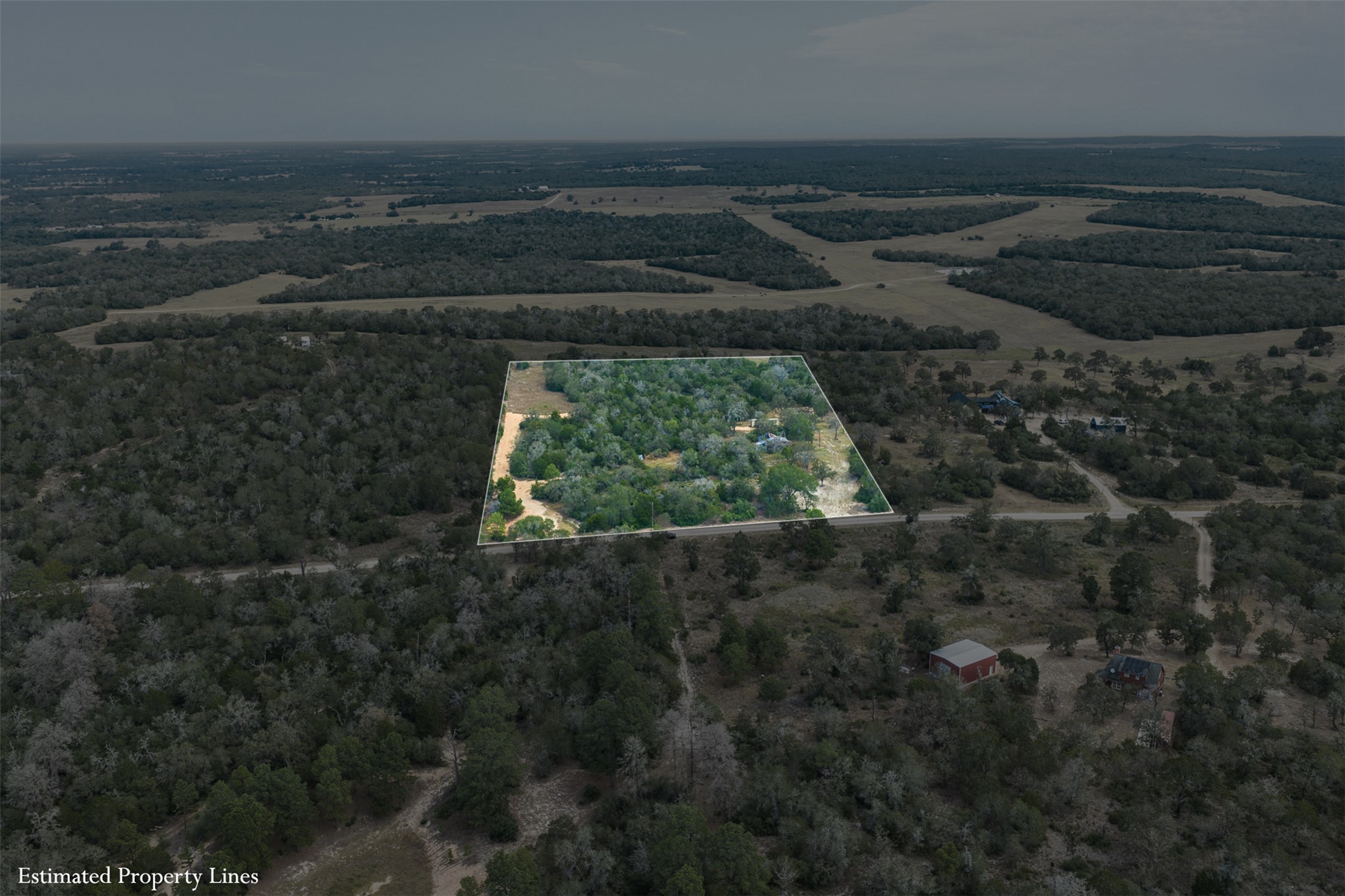 3301 Chuckwagon Road Harwood, TX 78632 - Photo 8 of 36 Mature woodlands and open clearings define this expansive rural acreage outlined from above.